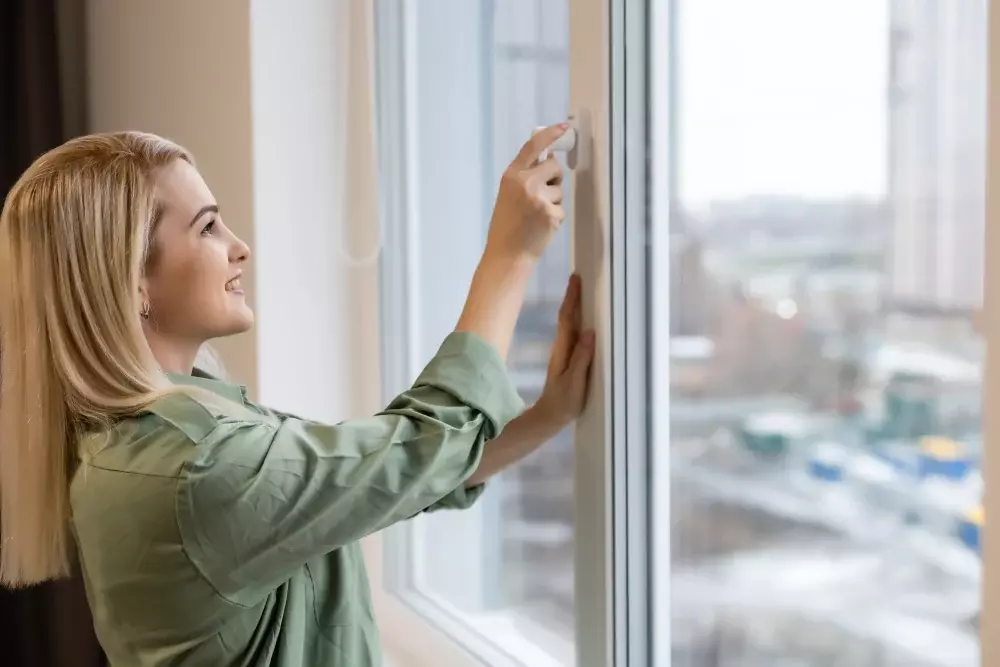 beautiful-woman-opening-window-morning